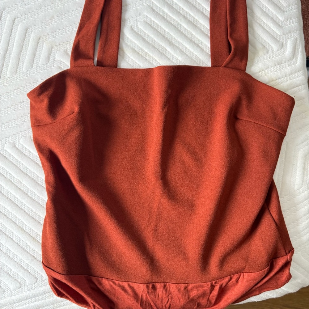 Brand new/never worn. Rust Orange Sleeveless Bodysuit - Picture 2 of 2